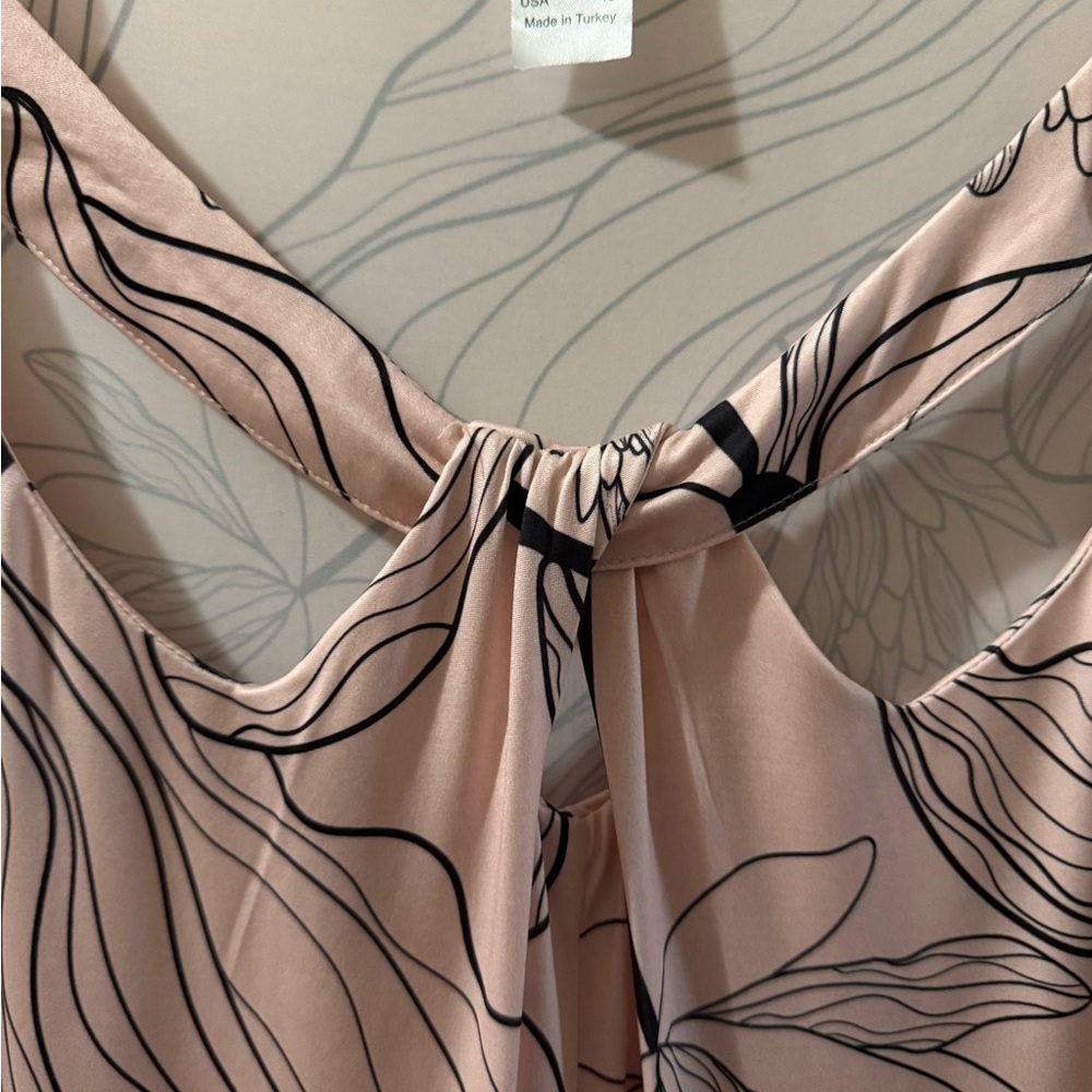 Elegant Blouse with Black Floral Design